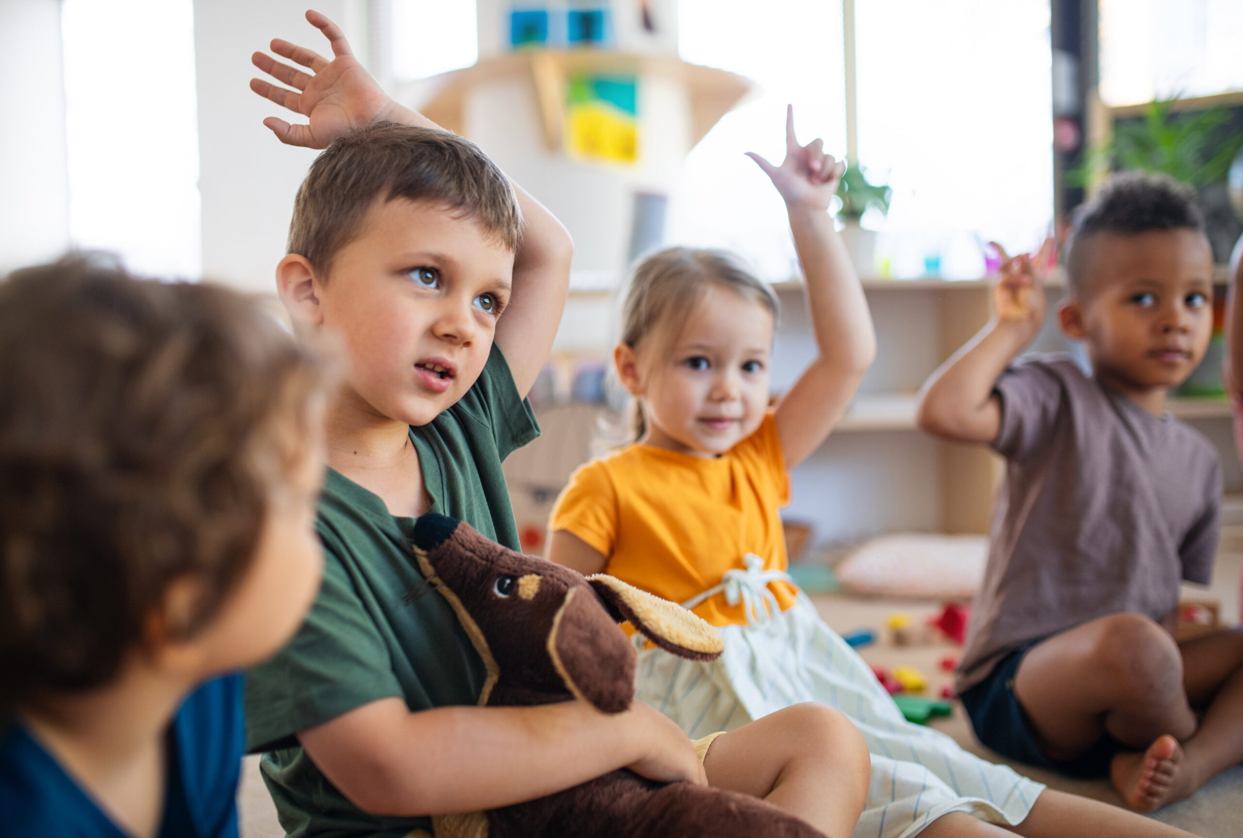 group-of-small-nursery-school-children-sitting-on-2022-01-18-23-39-24-utc